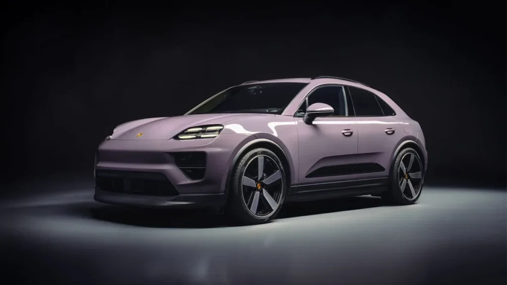 Sleek purple electric SUV in spotlight